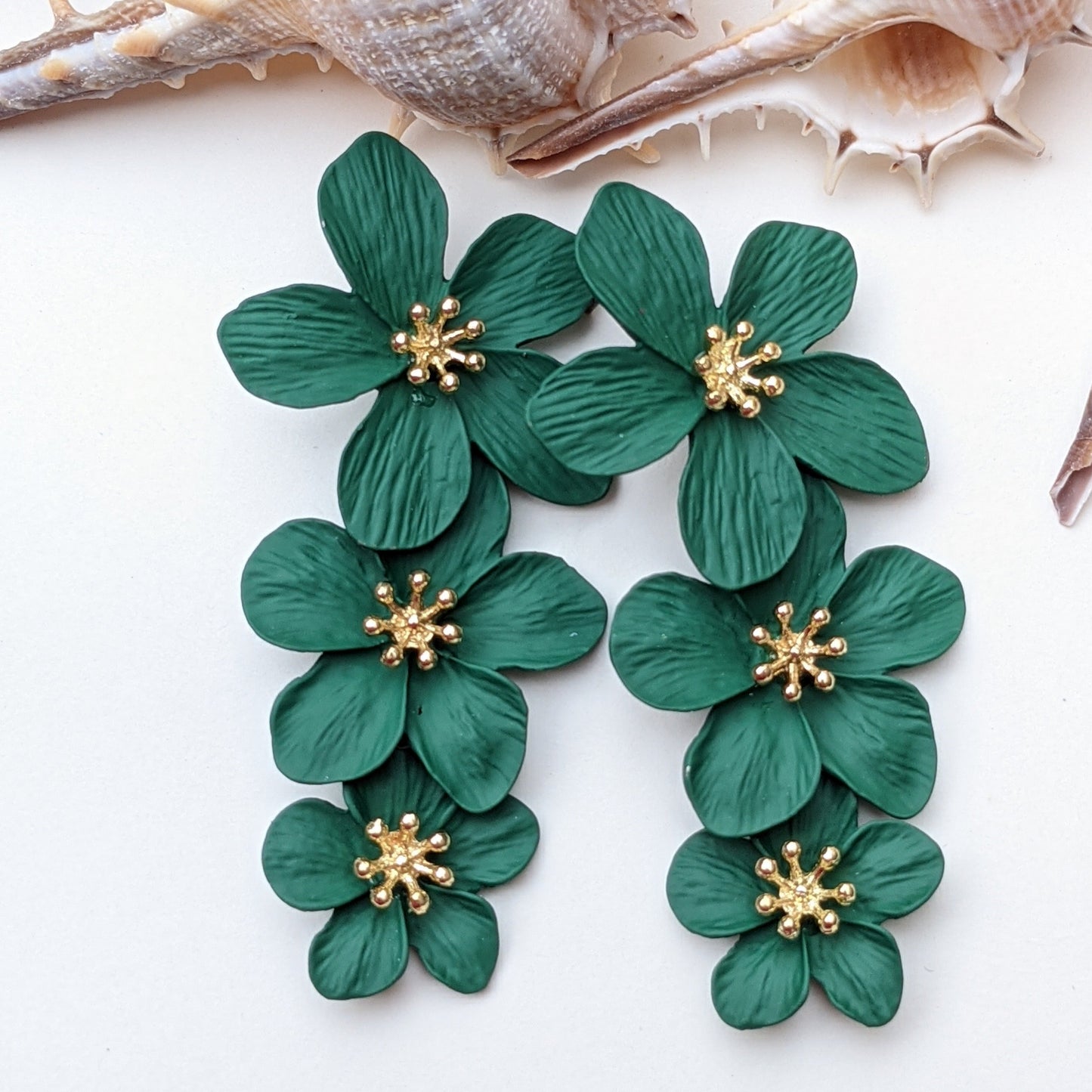Didi is a three layer fun and original floral acrylic earrings. Something about Didi that just gives us a fresh and renewed look, almost like hope. :)