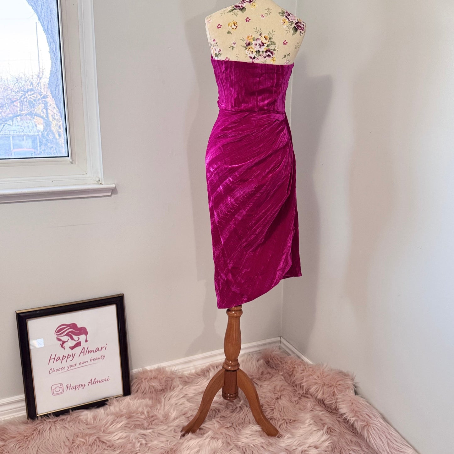 Turn heads in this stunning fuchsia velvet gown, designed to exude confidence and effortless glamour. Featuring a sculpted sweetheart neckline and expertly draped fabric that cinches at the waist, this dress enhances your natural silhouette with a flattering fit. The asymmetrical ruched detailing cascades into a flowing side drape, adding movement and dimension for a show-stopping effect.