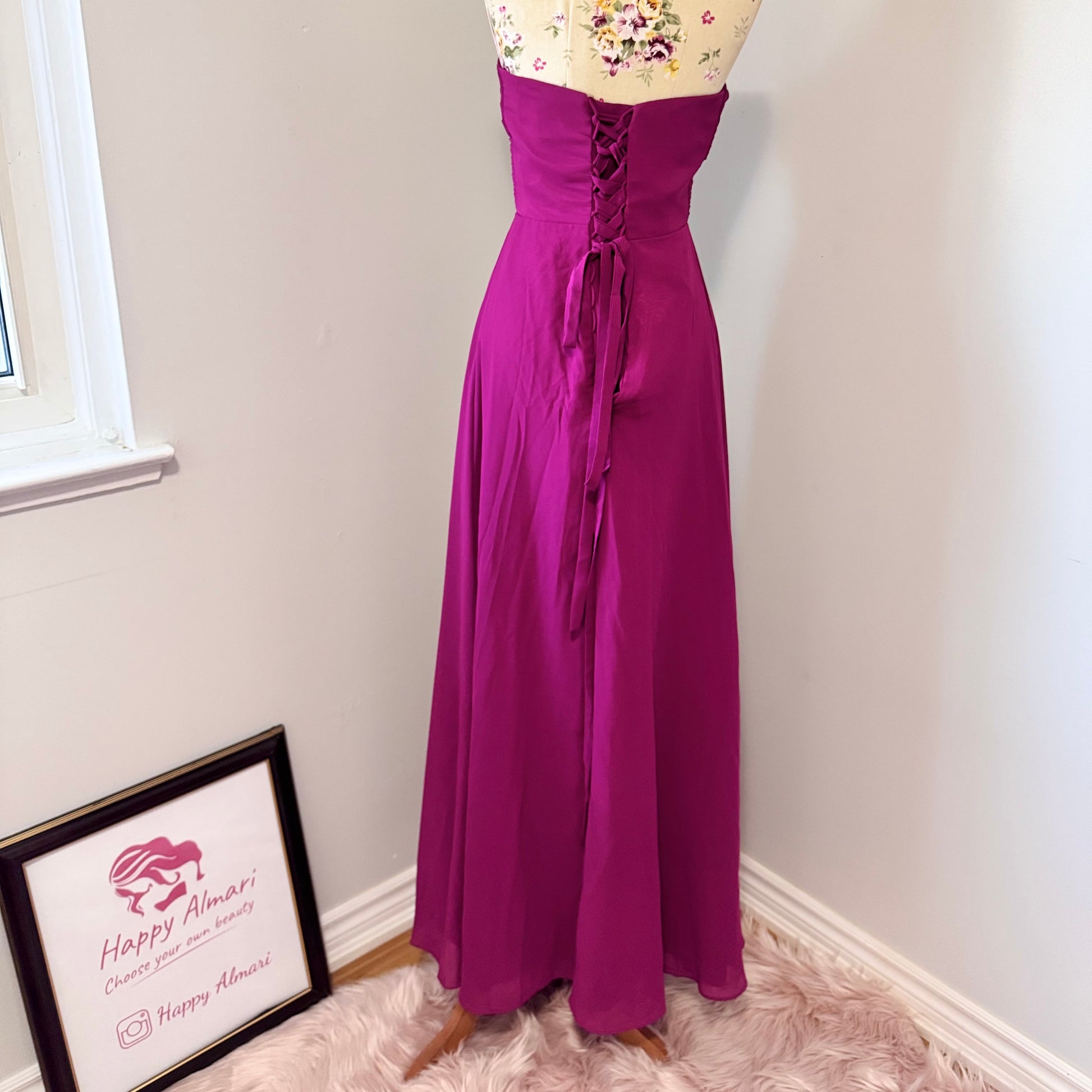 Make a statement in this breathtaking pre-owned, pristine-condition magenta gown, designed to turn heads at any formal event. Featuring a timeless sweetheart neckline with elegant ruched detailing, this floor-length dress flows effortlessly, creating a stunning silhouette that flatters every figure. The flowy chiffon fabric adds a touch of romance, perfect for weddings, galas, proms, or evening soirées. 