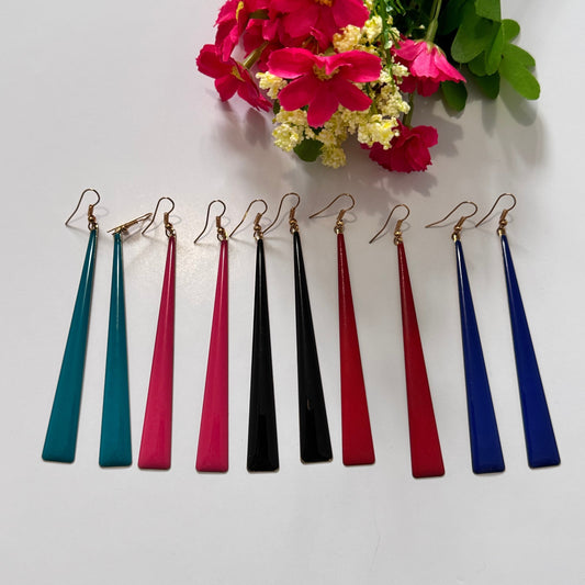 Upgrade your accessory game with these sleek and sophisticated long drop earrings, designed for the modern fashionista! Featuring a minimalist, tapered silhouette, these earrings exude elegance with a bold, contemporary twist. 