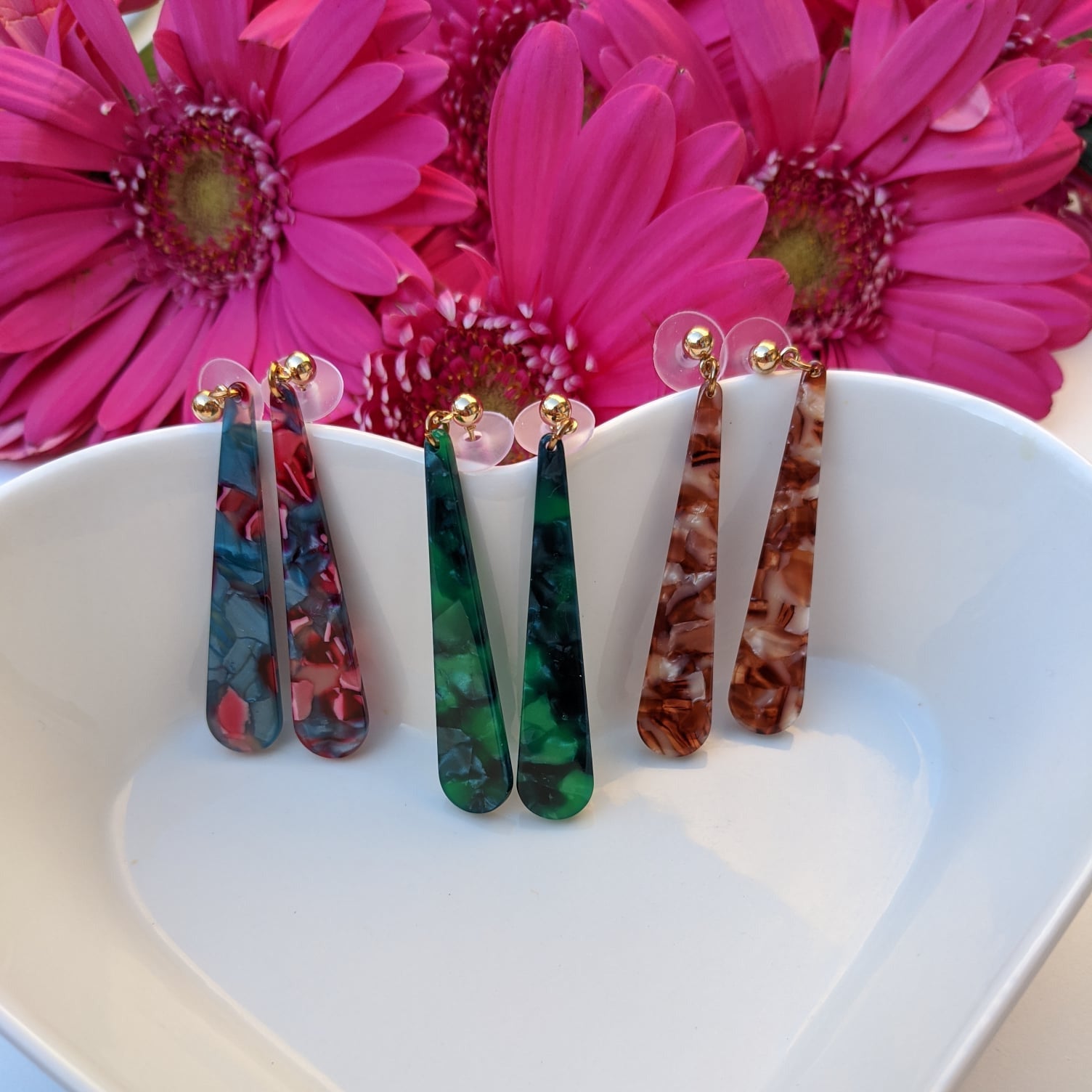 Elegant drop earrings with a striking blend of deep blue and rich red tones—perfect for a bold, modern statement