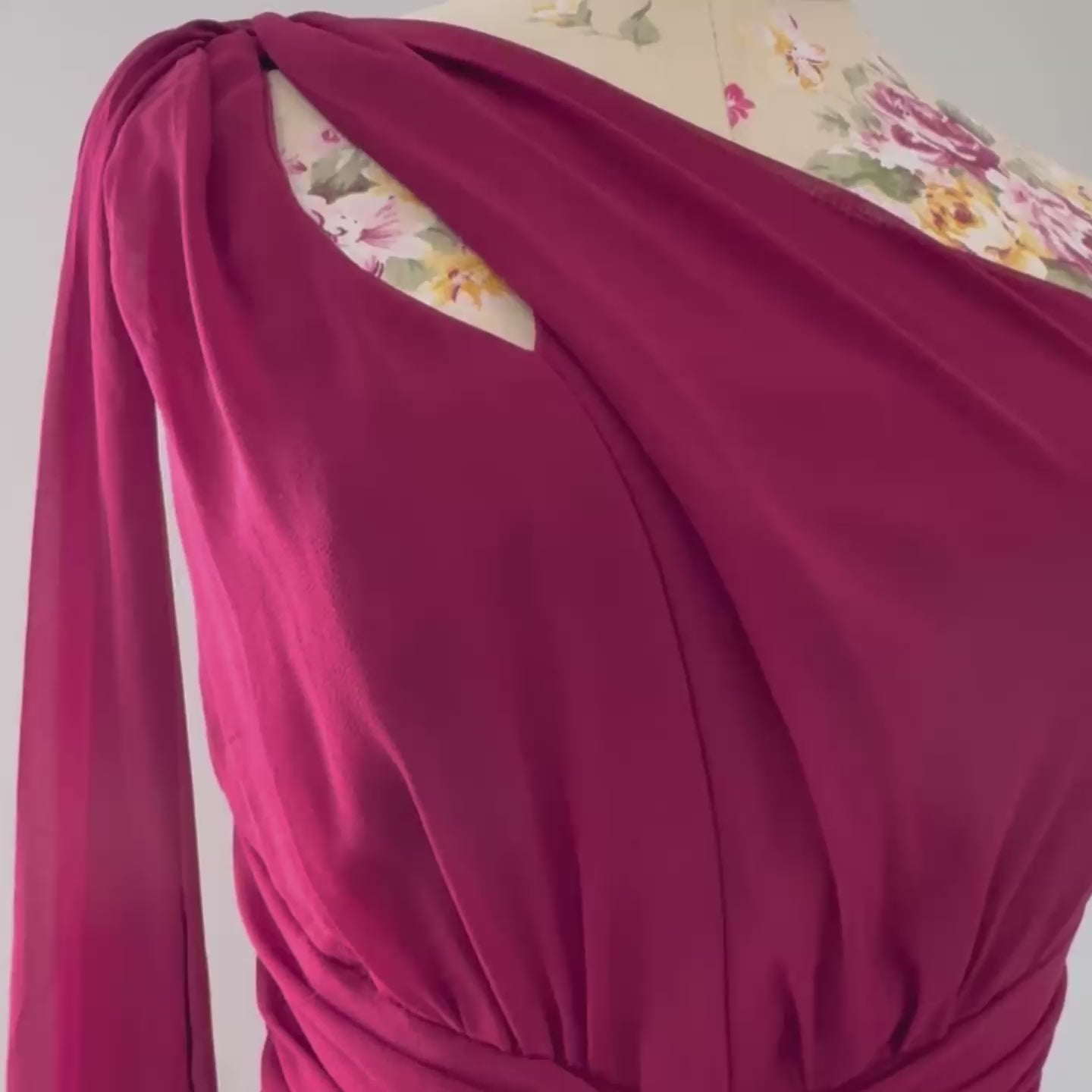 Elevate your wardrobe with this breathtaking one-shoulder gown in a deep wine hue, designed to make a statement at any formal event. Crafted from flowing chiffon, this dress drapes elegantly, featuring a cinched waist for a flattering silhouette and a striking sheer drape that adds an ethereal touch.