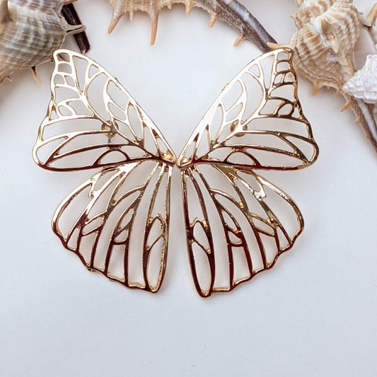 Wear the magic of transformation! These gold butterfly wing earrings are a stunning blend of elegance and whimsy, designed to make you feel effortlessly enchanting. Lightweight, radiant, and a true conversation starter—shop now and let your style take flight!