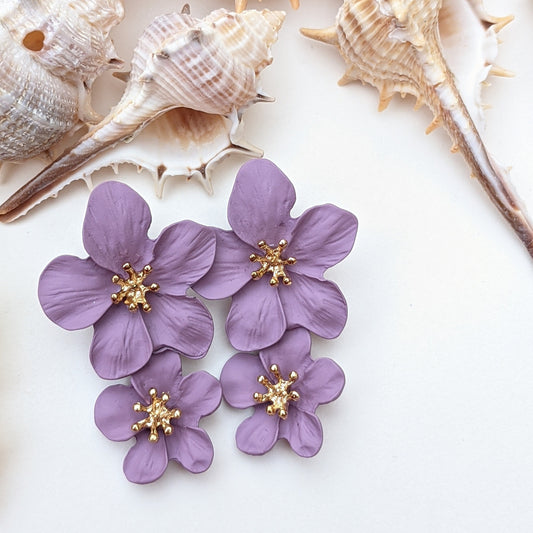 Dina is a two layer fun and original floral acrylic earrings. Something about Didi that just gives us a fresh and renewed look, almost like hope. :)
