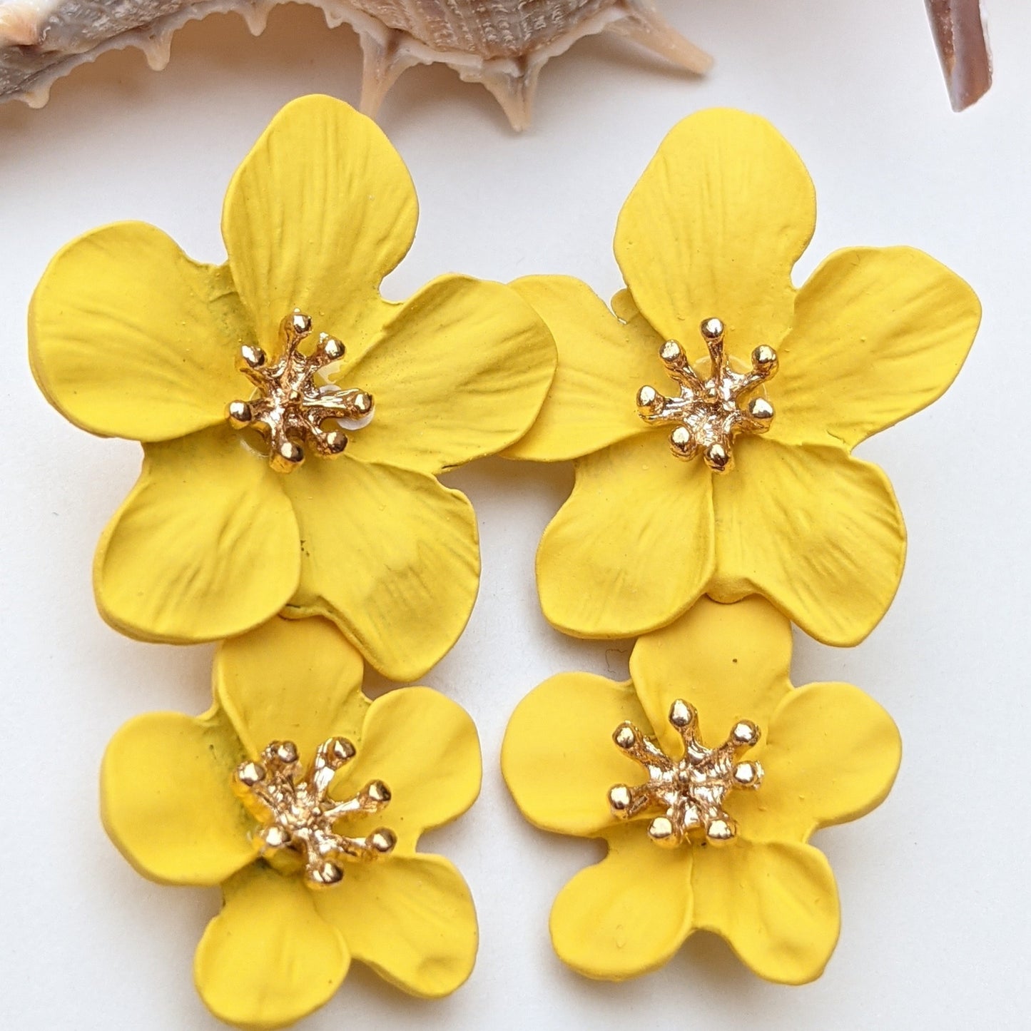 Dina is a two layer fun and original floral acrylic earrings. Something about Didi that just gives us a fresh and renewed look, almost like hope. :)
