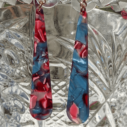 Elegant drop earrings with a striking blend of deep blue and rich red tones—perfect for a bold, modern statement